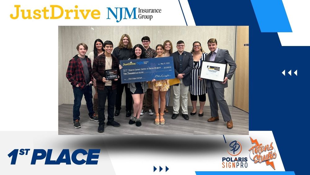 students posing with check